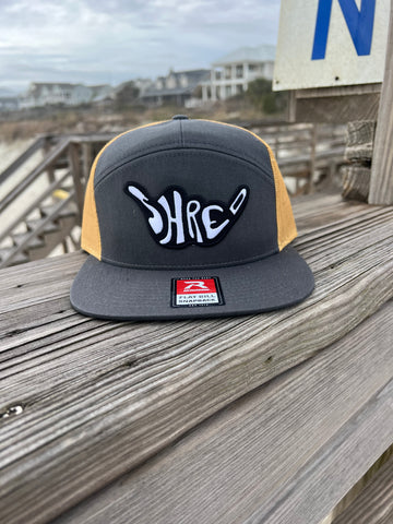 ShredDelish Shaka Charcoal & Old Gold 7 Panel Trucker Cap